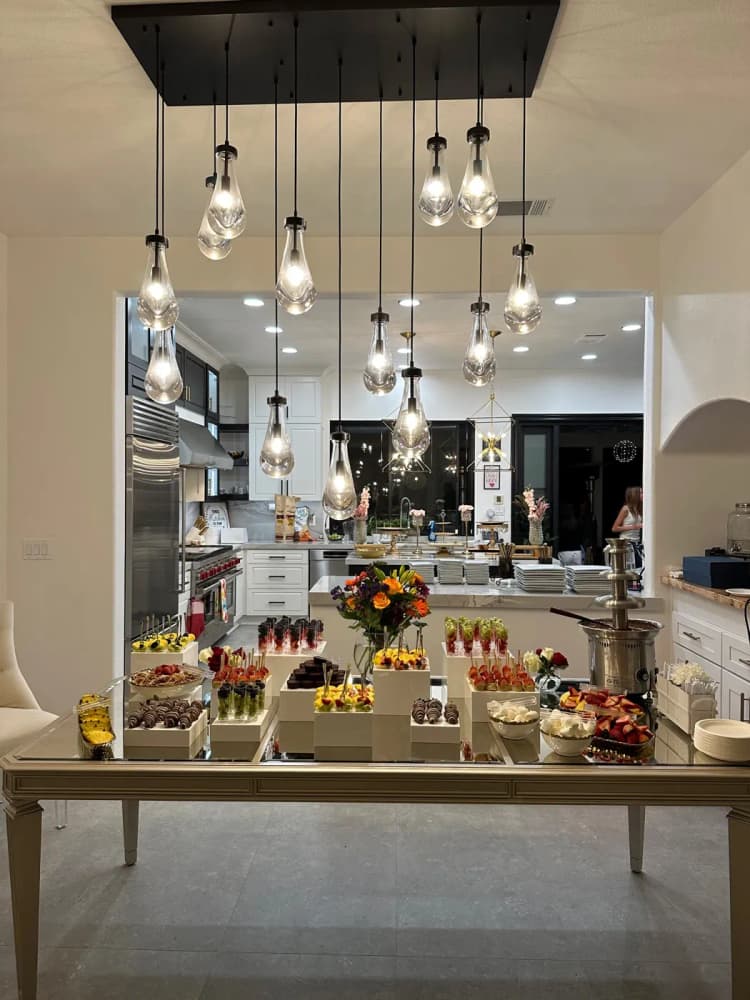 Le Cafe Du Parc catering attendant serving guests